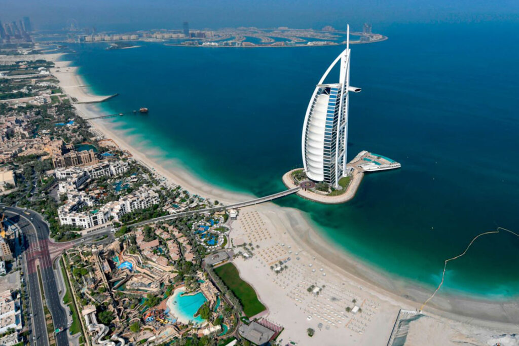 Iconic Dubai skyline featuring Burj Khalifa, The Dubai Mall, and stunning desert dunes.