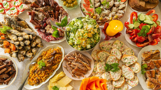 A delicious European meal featuring Swiss fondue, Italian pasta, and French pastries.