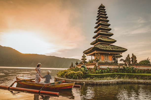 Beautiful Bali beach with clear blue water and palm trees
